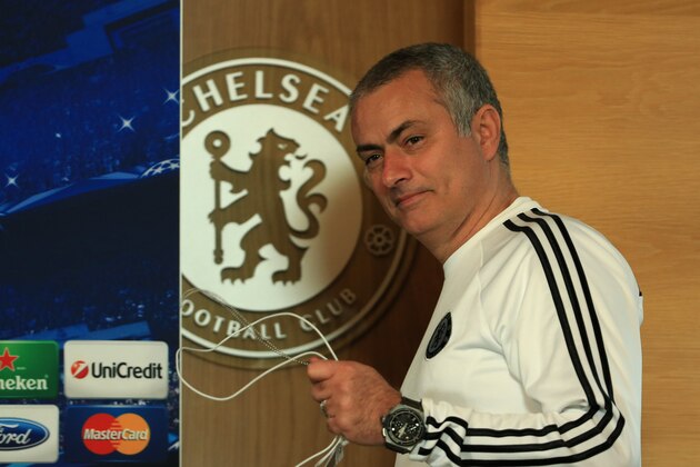 COBHAM, ENGLAND - DECEMBER 10:  Manager Jose Mourinho walks into the Chelsea FC Training press conference ahead of tomorrow's UEFA Champions League match against FC Steaua Bucuresti on December 10, 2013 in Cobham, England.  (Photo by Richard Heathcote/Getty Images)