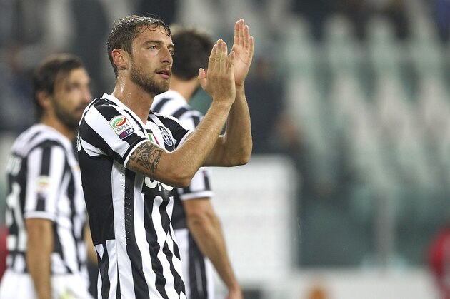 TURIN, ITALY - OCTOBER 06:  Claudio Marchisio of Juventus FC celebrates a victory at the end of the Serie A match between Juventus and AC Milan at Juventus Arena on October 6, 2013 in Turin, Italy.  (Photo by Marco Luzzani/Getty Images)