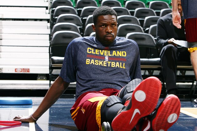 SALT LAKE CITY, UT - JANUARY 10:  Luol Deng #9 of the Cleveland Cavaliers stretches out before his first game with the Cavaliers, against the Utah Jazz before at EnergySolutions Arena on January 10, 2014 in Salt Lake City, Utah. NOTE TO USER: User expressly acknowledges and agrees that, by downloading and or using this Photograph, User is consenting to the terms and conditions of the Getty Images License Agreement. Mandatory Copyright Notice: Copyright 2013 NBAE (Photo by Melissa Majchrzak/NBAE via Getty Images)