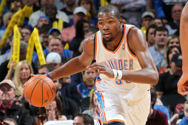 OKLAHOMA CITY, OK - JANUARY 11:  Kevin Durant #35 of the Oklahoma City Thunder handles the ball against the Milwaukee Bucks on January 11, 2014 at the Chesapeake Energy Arena in Oklahoma City, Oklahoma. NOTE TO USER: User expressly acknowledges and agrees that, by downloading and or using this Photograph, user is consenting to the terms and conditions of the Getty Images License Agreement. Mandatory Copyright Notice: Copyright 2014 NBAE (Photo by Layne Murdoch Jr./NBAE via Getty Images)
