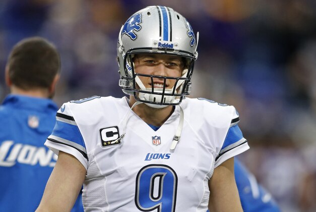 Dec 29, 2013; Minneapolis, MN, USA; Detroit Lions quarterback Matthew Stafford (9) smiles before the game with the Minnesota Vikings at Mall of America Field at H.H.H. Metrodome. Mandatory Credit: Bruce Kluckhohn-USA TODAY Sports