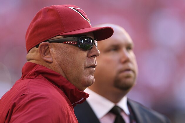 GLENDALE, AZ - DECEMBER 29:  Head coach Bruce Arians and general manager Steve Keim of the Arizona Cardinals watch warm ups before the NFL game against the San Francisco 49ers at the University of Phoenix Stadium on December 29, 2013 in Glendale, Arizona. The 49ers defeated the Cardinals 23-20.  (Photo by Christian Petersen/Getty Images)