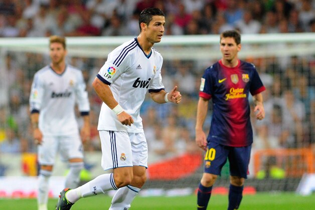 MADRID, SPAIN - AUGUST 29:  Cristiano Ronaldo of Real Madrid and Leo Messi of FC Barcelona react during the Supercopa second leg match between Real Madrid and Barcelona at Estadio Santiago Bernabeu on August 29, 2012 in Madrid, Spain.  (Photo by Gonzalo Arroyo Moreno/Getty Images)