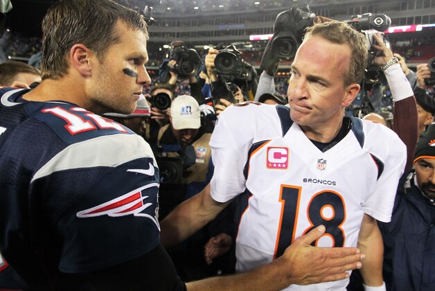 Oct 7, 2012; Foxborough, MA, USA; New England Patriots quarterback Tom Brady (12) shakes hands with Denver Broncos quarterback Peyton Manning (18) following the game at Gillette Stadium. The Patriots defeated the Broncos 31-21. Mandatory Credit: Stew Milne-USA TODAY Sports