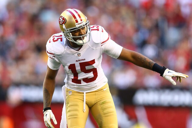 Dec 29, 2013; Phoenix, AZ, USA; San Francisco 49ers wide receiver Michael Crabtree (15) against the Arizona Cardinals at University of Phoenix Stadium. Mandatory Credit: Mark J. Rebilas-USA TODAY Sports
