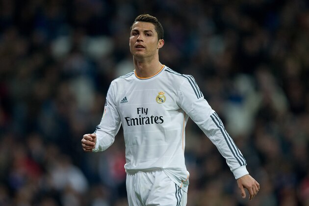 MADRID, SPAIN - JANUARY 09: Cristiano Ronaldo of Real Madrid CF looks on during the Copa del Rey Round of 8 first match between Real Madrid and CA Osasuna at Estadio Santiago Bernabeu on January 9, 2014 in Madrid, Spain.  (Photo by Gonzalo Arroyo Moreno/Getty Images)