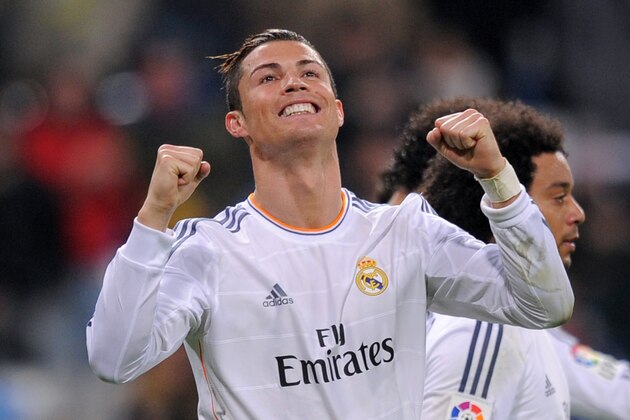 MADRID, SPAIN - JANUARY 06:  Cristiano Ronaldo of Real Madrid CF celebrates after scoring their third goal during the La Liga match between Real Madrid CF and RC Celta de Vigo at the Santiago Bernabeu stadium on January 6, 2014 in Madrid, Spain.  (Photo by Denis Doyle/Getty Images)
