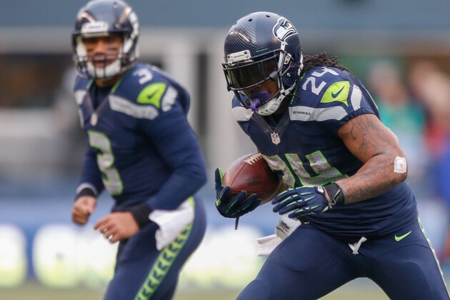SEATTLE, WA - DECEMBER 29:  Running back Marshawn Lynch #24 of the Seattle Seahawks rushes against the St. Louis Rams at CenturyLink Field on December 29, 2013 in Seattle, Washington.  (Photo by Otto Greule Jr/Getty Images)