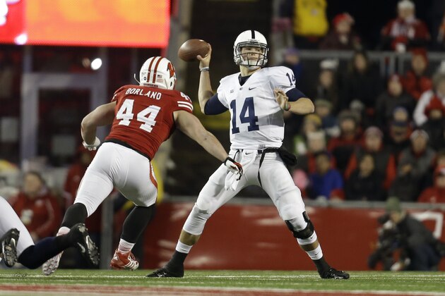 MADISON, WI - NOVEMBER 30: Christian Hackenberg #14 of the Penn State Nittany Lions drops back and passes the football during the second half of play against the Wisconsin Badgers at Camp Randall Stadium on November 30, 2013 in Madison, Wisconsin. (Photo by Mike McGinnis/Getty Images)