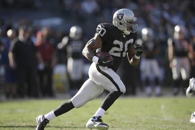 OAKLAND, CA - DECEMBER 29:  Darren McFadden #20 of the Oakland Raiders in action against the Denver Broncos at O.co Coliseum on December 29, 2013 in Oakland, California.  (Photo by Ezra Shaw/Getty Images)