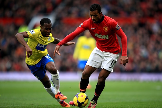 MANCHESTER, ENGLAND - DECEMBER 07: Nani of Manchester United is pursued by Vurnon Anita of Newcastle during the Barclays Premier League match between Manchester United and Newcastle United at Old Trafford on December 7, 2013 in Manchester, England. (Photo by Richard Heathcote/Getty Images) MANCHESTER, ENGLAND - DECEMBER 07: Nani of Manchester United is pursued by Vurnon Anita of Newcastle during the Barclays Premier League match between Manchester United and Newcastle United at Old Trafford on December 7, 2013 in Manchester, England. (Photo by Richard Heathcote/Getty Images)