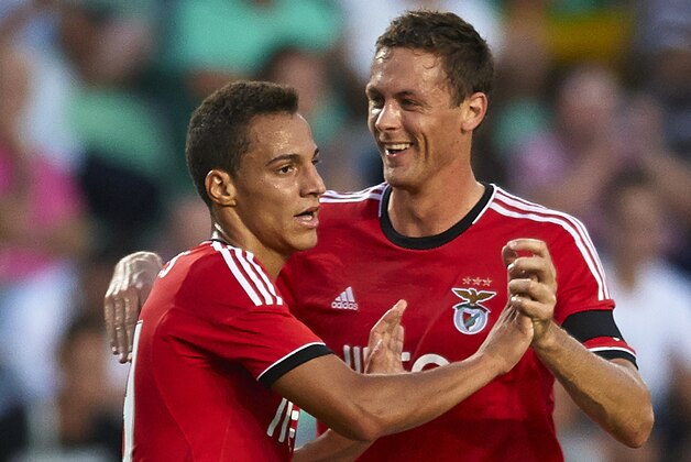 ELCHE, SPAIN - JULY 31:  Rodrigo (L) of Benfica celebrates with his teammate Matic during a friendly match between Elche CF and Benfica at Estadio Martinez Valero on July 31, 2013 in Elche, Spain.   (Photo by Manuel Queimadelos Alonso/Getty Images)