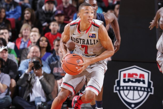 PORTLAND, OR - APRIL 20: Dante Exum #7 on the World Select Team drives against the USA Junior Select Team during the game on April 20, 2013 at the Rose Garden Arena in Portland, Oregon. NOTE TO USER: User expressly acknowledges and agrees that, by downloading and or using this photograph, User is consenting to the terms and conditions of the License Agreement. Mandatory Copyright Notice: Copyright 2012 (Photo by Sam Forencich)