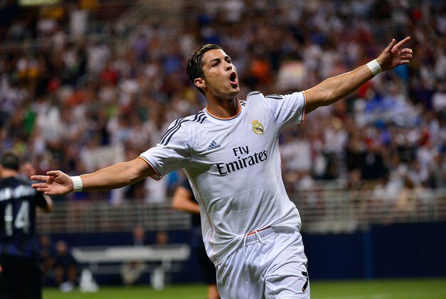 Aug 10, 2013; St. Louis, MO, USA; Real Madrid forward Cristiano Ronaldo (7) celebrates his goal against Inter Milan. Real Madrid defeated Inter Milan 3-0. Mandatory Credit: Scott Rovak-USA TODAY Sports