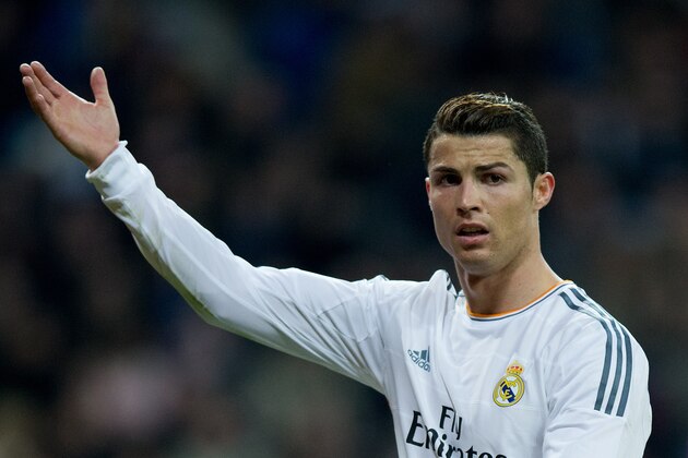MADRID, SPAIN - JANUARY 09:  Cristiano Ronaldo of Real Madrid CF protests to the referee during the Copa del Rey Round of 8 first match between Real Madrid and CA Osasuna at Estadio Santiago Bernabeu on January 9, 2014 in Madrid, Spain.  (Photo by Gonzalo Arroyo Moreno/Getty Images)