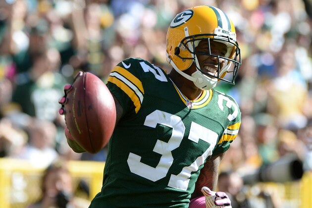 GREEN BAY, WI - OCTOBER 06:  Sam Shields #37 of the Green Bay Packers reacts as he is called for a penalty during the game against the Detroit Lions at Lambeau Field on October 6, 2013 in Green Bay, Wisconsin.  (Photo by Harry How/Getty Images)