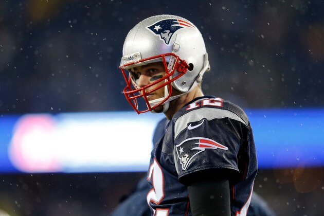 FOXBORO, MA - JANUARY 11:   Tom Brady #12 of the New England Patriots looks on against the Indianapolis Colts during the AFC Divisional Playoff game at Gillette Stadium on January 11, 2014 in Foxboro, Massachusetts.  (Photo by Jim Rogash/Getty Images)