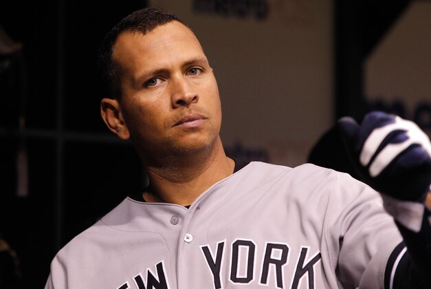 Aug 24, 2013; St. Petersburg, FL, USA; New York Yankees third baseman Alex Rodriguez (13) reacts in the dugout after he stuck out during the ninth inning against the Tampa Bay Rays at Tropicana Field. Tampa Bay Rays defeated the New York Yankees 4-2. Mandatory Credit: Kim Klement-USA TODAY Sports