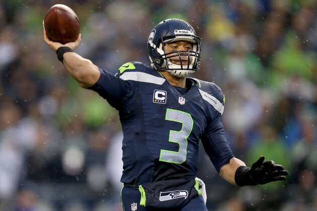 SEATTLE, WA - JANUARY 11: Quarterback Russell Wilson #3 of the Seattle Seahawks throws the ball in the second half while taking on the New Orleans Saints during the NFC Divisional Playoff Game at CenturyLink Field on January 11, 2014 in Seattle, Washington. (Photo by Jeff Gross/Getty Images) SEATTLE, WA - JANUARY 11: Quarterback Russell Wilson #3 of the Seattle Seahawks throws the ball in the second half while taking on the New Orleans Saints during the NFC Divisional Playoff Game at CenturyLink Field on January 11, 2014 in Seattle, Washington. (Photo by Jeff Gross/Getty Images)