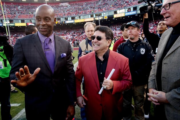 SAN FRANCISCO, CA - DECEMBER 23:  Former San Francisco 49er Jerry Rice stands with former team owner Eddie DeBartolo on the field before the last regular season game played at Candlestick Park between the San Francisco 49ers and the Atlanta Falcons on December 23, 2013 in San Francisco, California.  (Photo by Stephen Dunn/Getty Images)