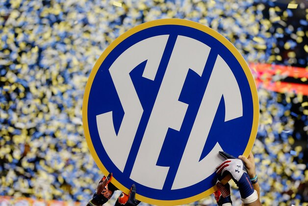ATLANTA, GA - DECEMBER 07: The Auburn Tigers hold up the SEC sign in celebration after defeating the Missouri Tigers 59-42 to win the SEC Championship Game at Georgia Dome on December 7, 2013 in Atlanta, Georgia. (Photo by Kevin C. Cox/Getty Images) ATLANTA, GA - DECEMBER 07: The Auburn Tigers hold up the SEC sign in celebration after defeating the Missouri Tigers 59-42 to win the SEC Championship Game at Georgia Dome on December 7, 2013 in Atlanta, Georgia. (Photo by Kevin C. Cox/Getty Images)