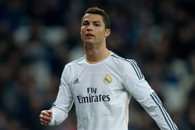 MADRID, SPAIN - JANUARY 09: Cristiano Ronaldo of Real Madrid CF looks on during the Copa del Rey Round of 8 first match between Real Madrid and CA Osasuna at Estadio Santiago Bernabeu on January 9, 2014 in Madrid, Spain.  (Photo by Gonzalo Arroyo Moreno/Getty Images)
