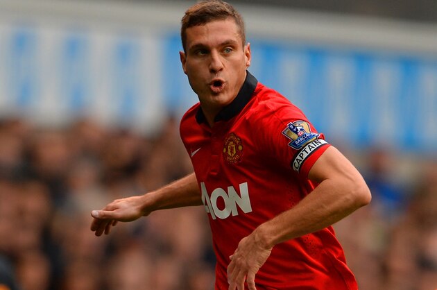 LONDON, ENGLAND - DECEMBER 01:  Nemanja Vidic of Manchester United on the ball during the Barclays Premier League Match between Tottenham Hotspur and Manchester United at White Hart Lane on December 1, 2013 in London, England.  (Photo by Michael Regan/Getty Images)