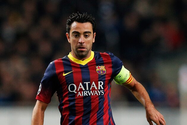 AMSTERDAM, NETHERLANDS - NOVEMBER 26:  Xavi of Barcelona in action during the UEFA Champions League Group H match between Ajax Amsterdam and FC Barcelona at Amsterdam Arena on November 26, 2013 in Amsterdam, Netherlands.  (Photo by Dean Mouhtaropoulos/Getty Images)
