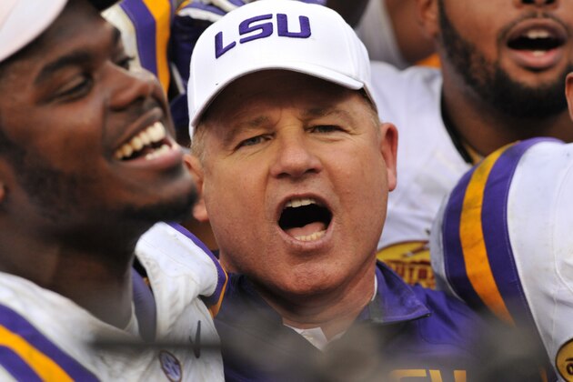 TAMPA, FL -  JANUARY 1:  Head coach Les Miles of the LSU Tigers celebrates after a 21-14 victory against the Iowa Hawkeyes January 1, 2014 in the Outback Bowl at Raymond James Stadium in Tampa, Florida.  (Photo by Al Messerschmidt/Getty Images)