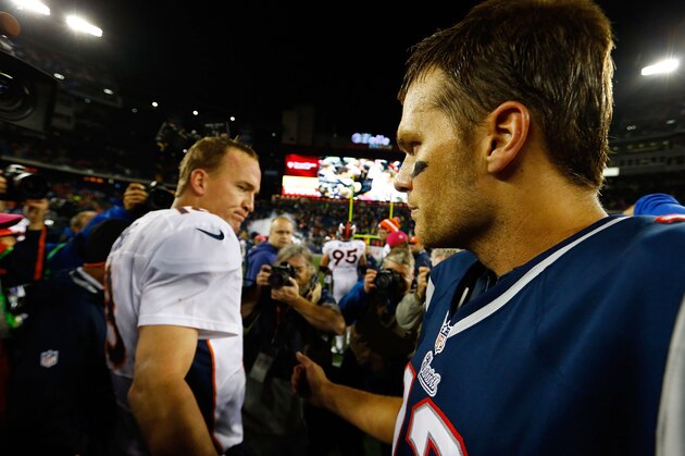 FOXBORO, MA - OCTOBER 07:  Tom Brady #12 of the New England Patriots and Peyton Manning #18 of the Denver Broncos greet each other at midfield following the game on October 7, 2012 at Gillette Stadium in Foxboro, Massachusetts.  (Photo by Jared Wickerham/Getty Images)