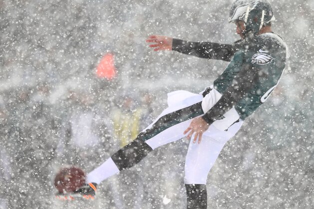 PHILADELPHIA, PA - DECEMBER 08:  Donnie Jones #8 of the Philadelphia Eagles punts the ball in the first quarter against the Detroit Lions on December 8, 2013 at Lincoln Financial Field in Philadelphia, Pennsylvania.  (Photo by Elsa/Getty Images)