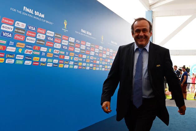 COSTA DO SAUIPE, BRAZIL - DECEMBER 06:  FIFA Executive Committee member Michel Platini smiles as he arrives for the Final Draw for the 2014 FIFA World Cup Brazil at Costa do Sauipe Resort on December 6, 2013 in Costa do Sauipe, Bahia, Brazil.  (Photo by Buda Mendes/Getty Images)
