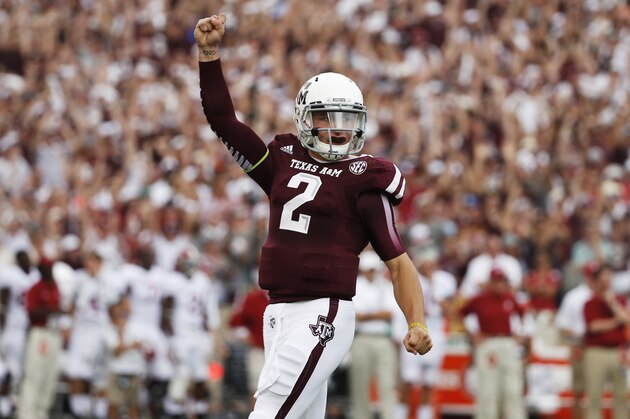 COLLEGE STATION, TX - SEPTEMBER 14:  Johnny Manziel #2 of the Texas A&M Aggies celebrates after throwing a first quarter touchdown during a game against the Alabama Crimson Tide at Kyle Field on September 14, 2013 in College Station, Texas.  (Photo by Scott Halleran/Getty Images)