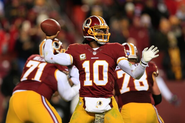 LANDOVER, MD - NOVEMBER 25:  Quarterback Robert Griffin III #10 of the Washington Redskins throws a fourth quarter pass during the Redskins 27-6 loss to the San Francisco 49ers at FedExField on November 25, 2013 in Landover, Maryland.  (Photo by Rob Carr/Getty Images)