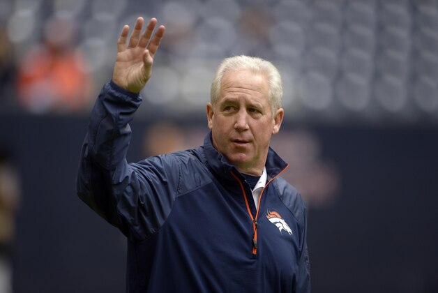 Dec 22, 2013; Houston, TX, USA; Denver Broncos head coach John Fox waves to fans before the game against the Houston Texans at Reliant Stadium. Mandatory Credit: Thomas Campbell-USA TODAY Sports
