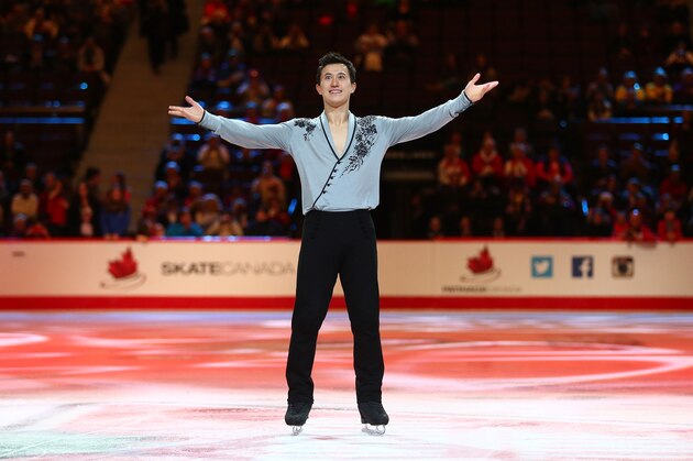 OTTAWA, ON - JANUARY 11: Patrick Chan celebrates his Senior Men's  win during the awards ceremony of the 2014 Canadian Tire National Figure Skating Championships at Canadian Tire Centre on January 11, 2014 in Ottawa, Ontario, Canada.  (Photo by Andre Ringuette/Getty Images)