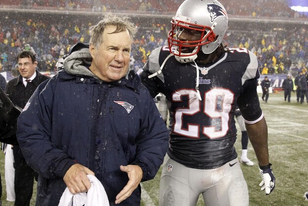 Dec 29, 2013; Foxborough, MA, USA; New England Patriots head coach Bill Belichick and running back LeGarrette Blount (29) after the game against the Buffalo Bills at Gillette Stadium. The Patriots defeated the Bills 34-20.0 Mandatory Credit: David Butler II-USA TODAY Sports