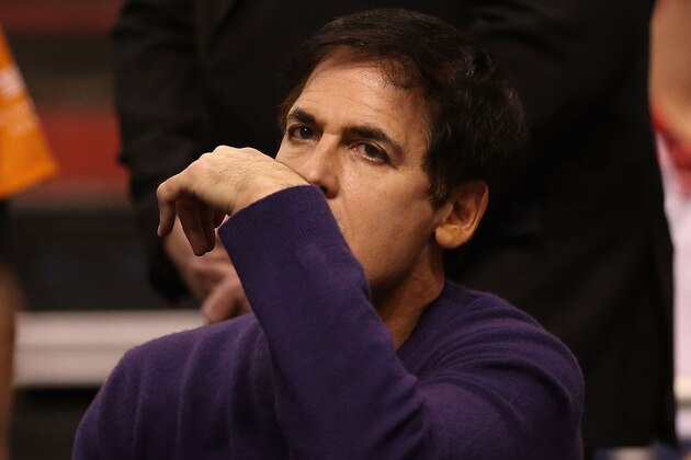 PHOENIX, AZ - DECEMBER 21:  Dallas Mavericks owner, Mark Cuban reacts during the NBA game against the Phoenix Suns at US Airways Center on December 21, 2013 in Phoenix, Arizona.  The Suns defeated the Mavericks 123-108. NOTE TO USER: User expressly acknowledges and agrees that, by downloading and or using this photograph, User is consenting to the terms and conditions of the Getty Images License Agreement.  (Photo by Christian Petersen/Getty Images)