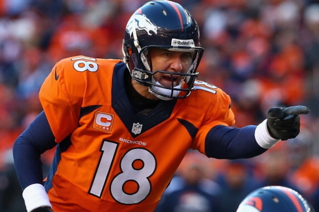 DENVER, CO - JANUARY 12:   Peyton Manning #18 of the Denver Broncos calls a play during the AFC Divisional Playoff Game against the San Diego Chargers at Sports Authority Field at Mile High on January 12, 2014 in Denver, Colorado.  (Photo by Doug Pensinger/Getty Images)