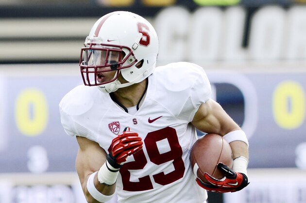 Nov 3, 2012; Boulder, CO, USA; Stanford Cardinal safety Ed Reynolds (29) returns an interception for a touchdown in the first quarter of the game against the Colorado Buffaloes at Folsom Field. Mandatory Credit: Ron Chenoy-USA TODAY Sports