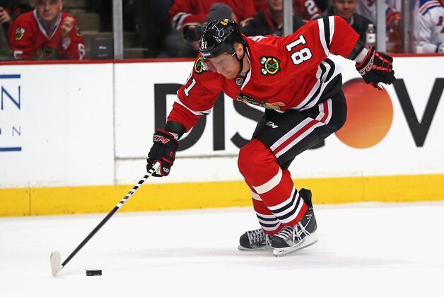 CHICAGO, IL - JANUARY 08: Marian Hossa #81 of the Chicago Blackhawks breaks up the ice against the New York Rangers at the United Center on January 8, 2014  in Chicago, Illinois. The Rangers defeated the Blackhawks 3-2. (Photo by Jonathan Daniel/Getty Images)
