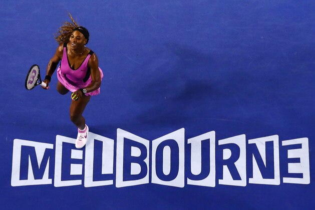 MELBOURNE, AUSTRALIA - JANUARY 13:  Serena Williams of the United States celebrates winning a point in her first round match against Ashleigh Barty of Australia during day one of the 2014 Australian Open at Melbourne Park on January 13, 2014 in Melbourne, Australia.  (Photo by Matt King/Getty Images)