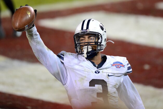 Dec 20, 2012; San Diego, CA, USA; Brigham Young Cougars linebacker Kyle Van Noy (3) celebrates after running back an interception for a touchdown during the fourth quarter against the San Diego State Aztecs at Qualcomm Stadium. Mandatory Credit: Jake Roth-USA TODAY Sports