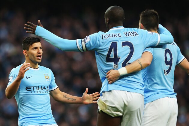 MANCHESTER, ENGLAND - NOVEMBER 24:  Sergio Aguero of Manchester City celebrates his second goal with Yaya Toure and Alvaro Negredo during the Barclays Premier League match between Manchester City and Tottenham Hotspur at Etihad Stadium on November 24, 2013 in Manchester, England.  (Photo by Alex Livesey/Getty Images)