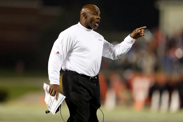 LOUISVILLE, KY - OCTOBER 26:  Charlie Strong the head coach of the Louisville Cardinals disagrees with an offical's calll during the game against the Cincinnati Bearcats at Papa John's Cardinal Stadium on October 26, 2012 in Louisville, Kentucky.  (Photo by Andy Lyons/Getty Images)