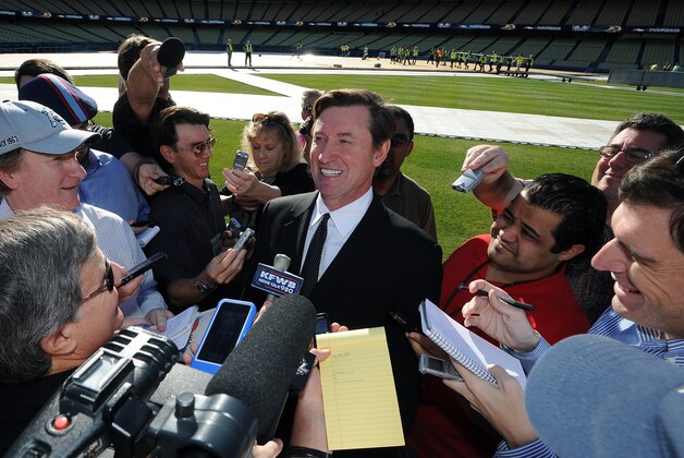 LOS ANGELES, CA - JANUARY 13:  Hockey legend Wayne Gretzky talks to the media after the NHL 'ice truck' arrival for the 2014 Coors Light NHL Stadium Series Game on January 13, 2014 at Dodger Stadium in Los Angeles, California. (Photo by Juan Ocampo/NHLI via Getty Images)