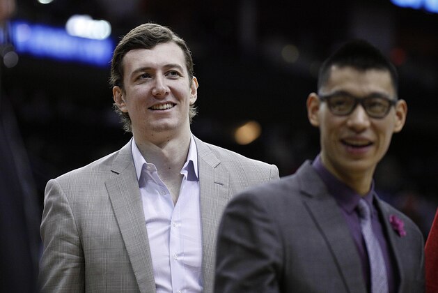 Dec 18, 2013; Houston, TX, USA; Houston Rockets center Omer Asik (3) and point guard Jeremy Lin (7) walk to the locker room during halftime at Toyota Center. Mandatory Credit: Andrew Richardson-USA TODAY Sports