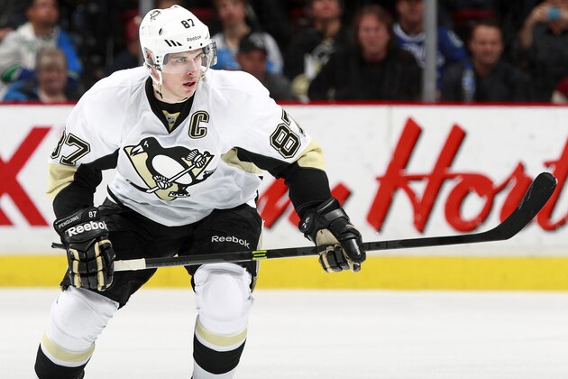 VANCOUVER, BC - JANUARY 7:  Sidney Crosby #87 of the Pittsburgh Penguins skates up ice during their NHL game against the Vancouver Canucks at Rogers Arena January 7, 2014 in Vancouver, British Columbia, Canada. Pittsburgh won 5-4 in a shootout. (Photo by Jeff Vinnick/NHLI via Getty Images)