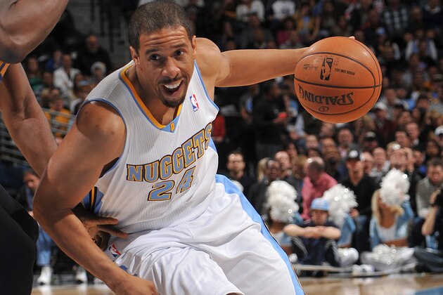 DENVER, CO - December 23: Andre Miller #24 of the Denver Nuggets drives to the basket against the Golden State Warriors on December 23, 2013 at the Pepsi Center in Denver, Colorado. NOTE TO USER: User expressly acknowledges and agrees that, by downloading and/or using this Photograph, user is consenting to the terms and conditions of the Getty Images License Agreement. Mandatory Copyright Notice: Copyright 2013 NBAE (Photo by Bart Young/NBAE via Getty Images)