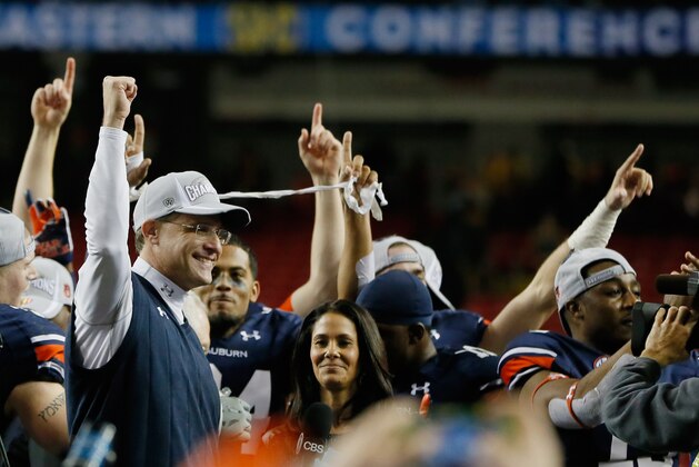 ATLANTA, GA - DECEMBER 07:  Head coach Gus Malzahn of the Auburn Tigers celebrates after their 59-42 win over the Missouri Tigers during the SEC Championship Game at Georgia Dome on December 7, 2013 in Atlanta, Georgia.  (Photo by Kevin C. Cox/Getty Images)
